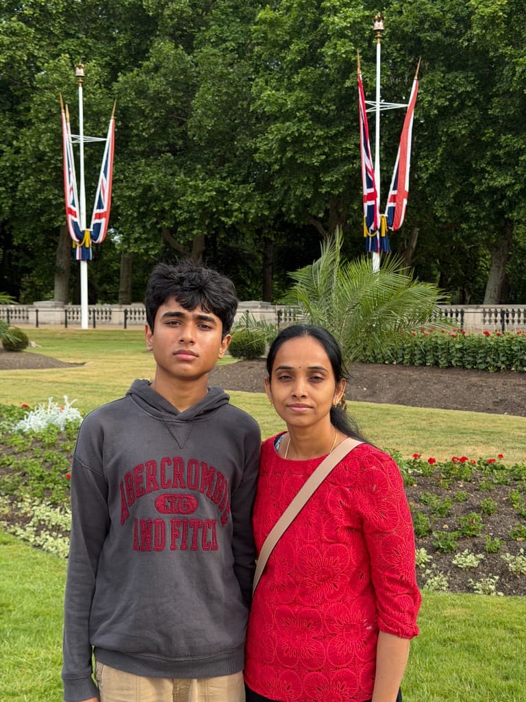 Sudhith Mannuru standing with Sravani Mannuru in a garden.